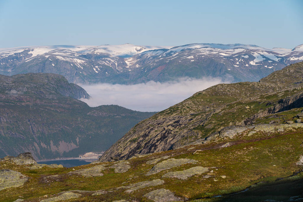 Beautiful landscape of mountains and lake between the way to Trolltunga cliff in Odda western of Norway in summer season, Norway, Scandinavia, Europe - Фото, зображення