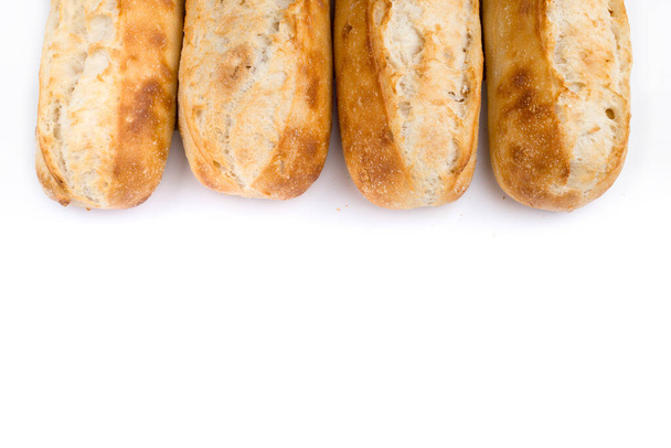 French bread rolls in a row with copy space.  - Fotoğraf, Görsel