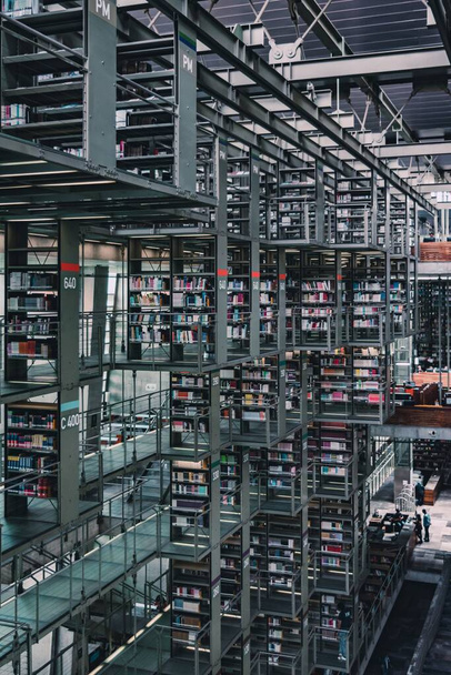 A vertical closeup shot of bookshelves of Vasconcelos Library, Mexico - Valokuva, kuva