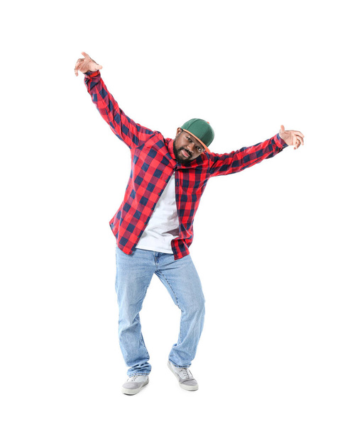 Male African-American hip-hop dancer on white background - Foto, afbeelding