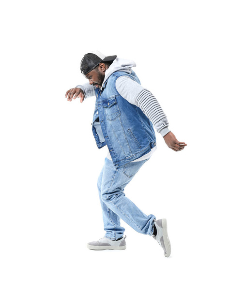 Male African-American hip-hop dancer on white background - Φωτογραφία, εικόνα