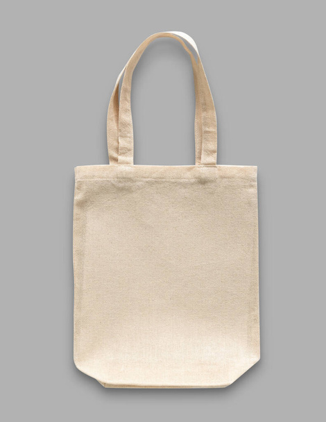 Bolso de mano tela de tela de algodón para eco shopping saco maqueta plantilla en blanco aislado sobre fondo gris (camino de recorte
) - Foto, imagen