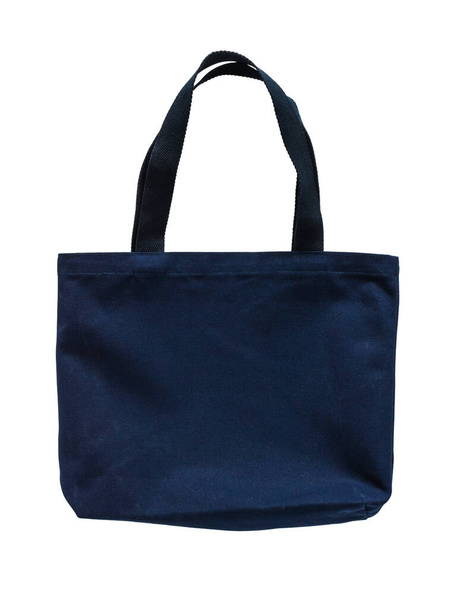 Tote taška plátno bavlněné tkaniny tkaniny v tmavé námořní modré barvě pro eko rameno nákupní pytel mokup prázdné šablony izolované na bílém pozadí (výstřižek cesta) - Fotografie, Obrázek