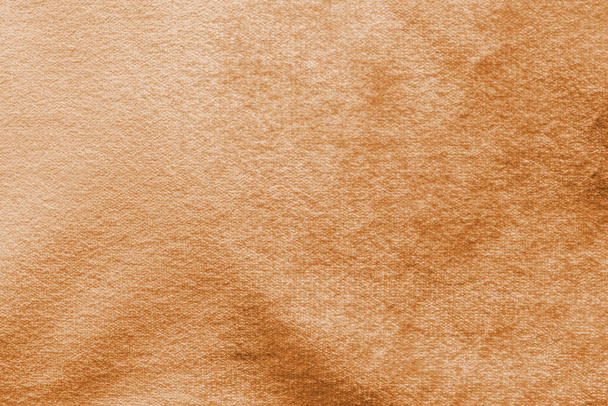 Fondo de terciopelo dorado de cobre o textura de franela de terciopelo amarillo dorado hecha de algodón o lana con suave tela de satén terciopelo esponjoso material de color metálico    - Foto, Imagen