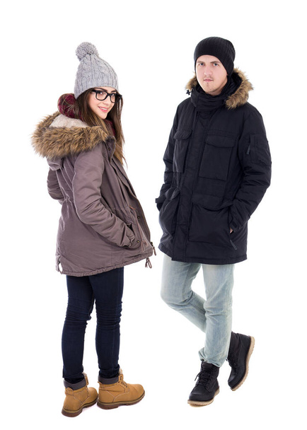 молодая пара в зимних куртках изолированы на белом фоне
 - Фото, изображение