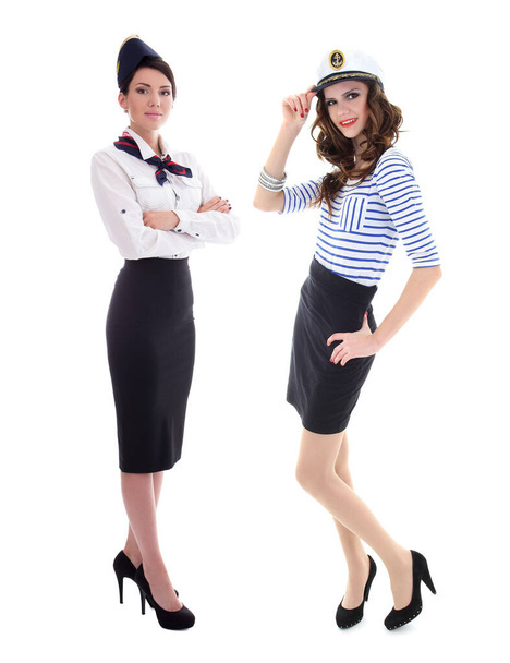 young women stewardesses posing in uniform isolated on white background - Photo, Image