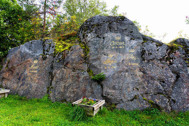 LOFOTEN, NORWAY - SEPT 10, 2019: Signs of three Norwegian kings placed on a solid rock - Photo, Image