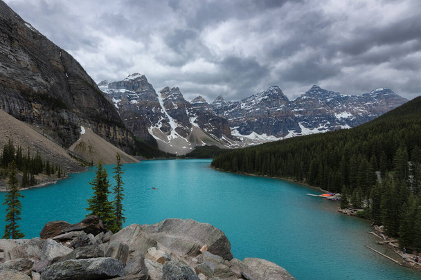 Rocky Mountains in cloudy day, Moraine Lake, Banff National Park, Canada - Photo, Image