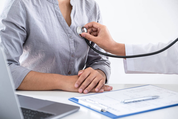 Doctor using a stethoscope checking patient with examining, presenting results symptom and recommend treatment method, Healthcare and medical concept. - Photo, Image