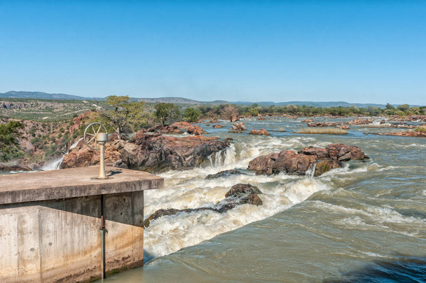 A water inlet for pipeline at the top of the Ruacana waterfall in the Kunene River - Photo, Image