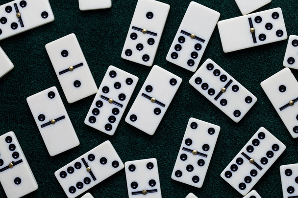 Falling dominoes. Domino effect. The domino game. - 写真・画像