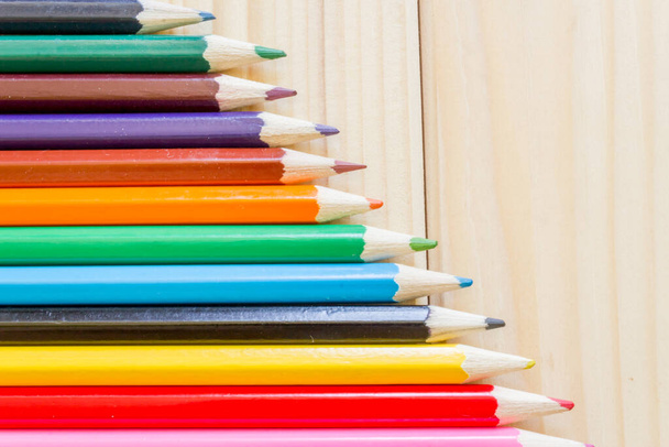 Macro of a few colored pencils on wood - Foto, imagen