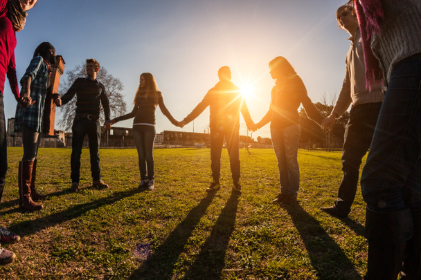 Multiracial Young People Holding Hands in a Circle - Photo, Image