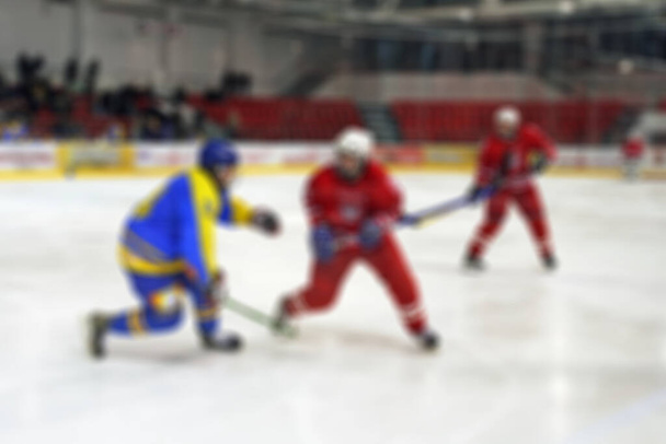 Αφηρημένη θολούρα των παικτών χόκεϊ επί πάγου στο παιχνίδι τουρνουά. Ιστορικό Bokeh - Φωτογραφία, εικόνα