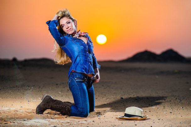 Portrait of beautiful country girl in front of red sunset - Photo, image