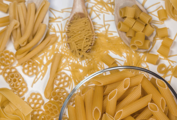 Pastry, concept photo in the kitchen; raw macaroni. - Foto, Imagem