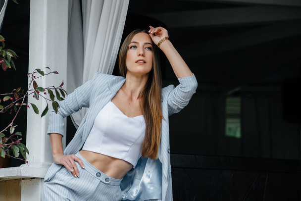 Beautiful young girl posing while relaxing, business woman. Relaxation. - Valokuva, kuva