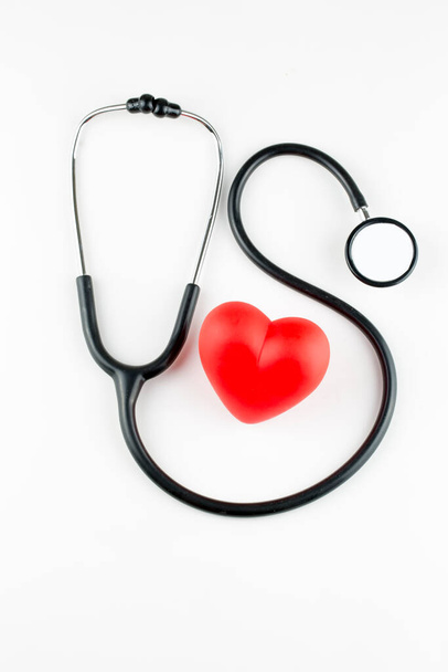 Stethoscope and red heart. Heart Check. Concept healthcare. - Foto, imagen