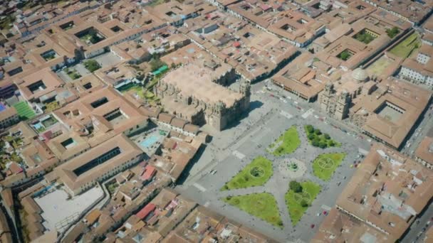 Aerial view around Cathedral and Church of the Society of Jesus. Most important points to visit in Cusco, Peru - Footage, Video