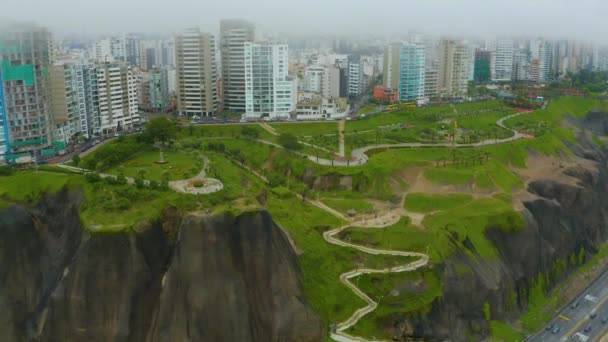 Aerial view of Miraflores neighborhood. Humid climate. The buildings close to coast often are covered by fog and low clouds. - Footage, Video
