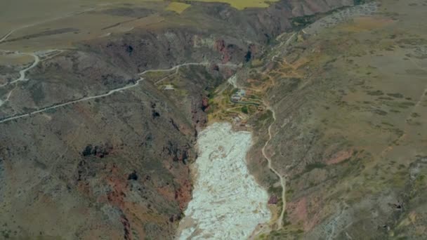 View from above. Salinas or Salineras  de Maras, man-made salt mines near Cusco, Peru - Materiał filmowy, wideo