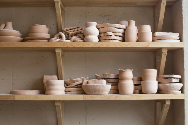 pottery. pots, dishes, and other articles made of earthenware. - Foto, Imagen