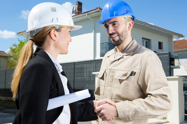 architect and contractor shaking hands - Photo, image