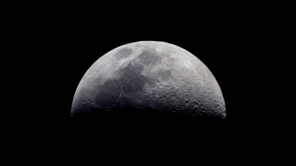 Telescope Zooming On The Moon shows the First Quarter over a dark black sky, as seen from the POV of a spaceship flying towards the moon - Footage, Video