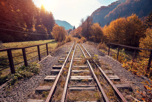 Abandoned old railway in mountains in autumn - Foto, Imagem