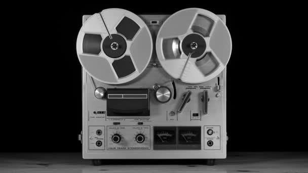 Studio shot of an old Vintage Reel to Reel taperecorder playing music - Footage, Video