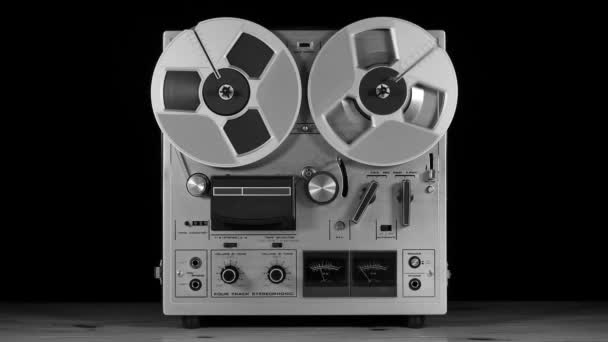 Studio shot of an old Vintage Reel to Reel taperecorder playing music - Footage, Video