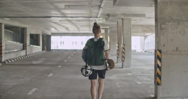 Teenager girl football soccer player practicing - Felvétel, videó