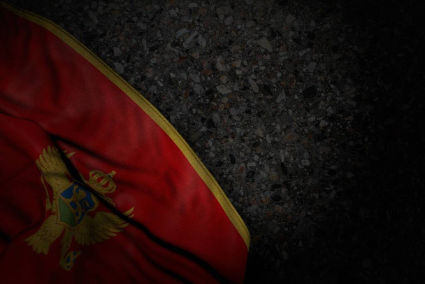 pretty dark illustration of Montenegro flag with large folds on dark asphalt with free place for text - any celebration flag 3d illustration - Φωτογραφία, εικόνα