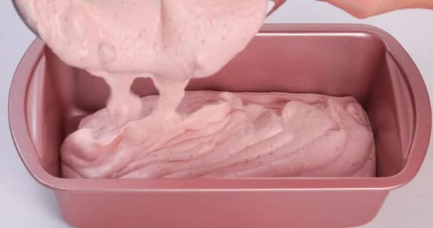 Homemade strawberry ice cream. Preparing ice cream in stainless steel ice cream container. Dolly shot 4k - Footage, Video