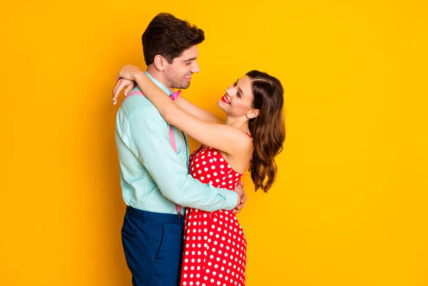 Portrait of positive passionate couple man woman hug embrace cuddle eternal love concept formalwear red dotted dress blue shirt pants isolated over bright shine color background - Φωτογραφία, εικόνα