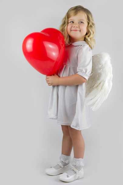 Angel with red heart - Photo, image