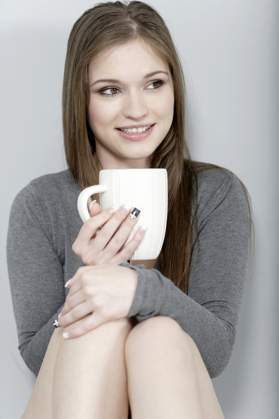 Woman enjoying a coffee - Zdjęcie, obraz