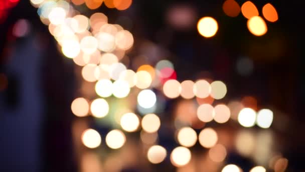 Bokeh elvont elmosódott háttér ünnepi forgalom piros lámpák autó közúti pezsgő körkörös animációs mozgás 3D. Háttér csillogó fényes alakú villogó fények a modern városban - Felvétel, videó