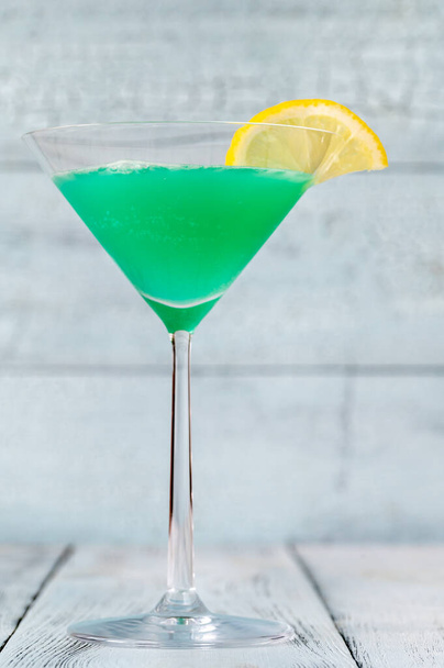 Glass of Green Screwdriver cocktail drink - Photo, Image