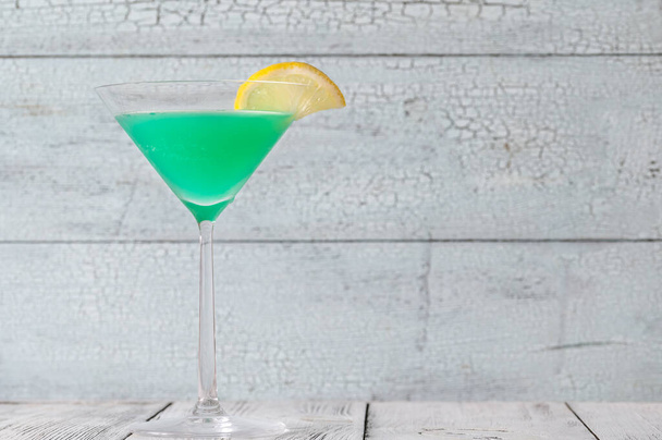 Glass of Green Screwdriver cocktail drink - Photo, Image