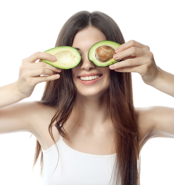 Smiling woman with with avocado - Fotografie, Obrázek