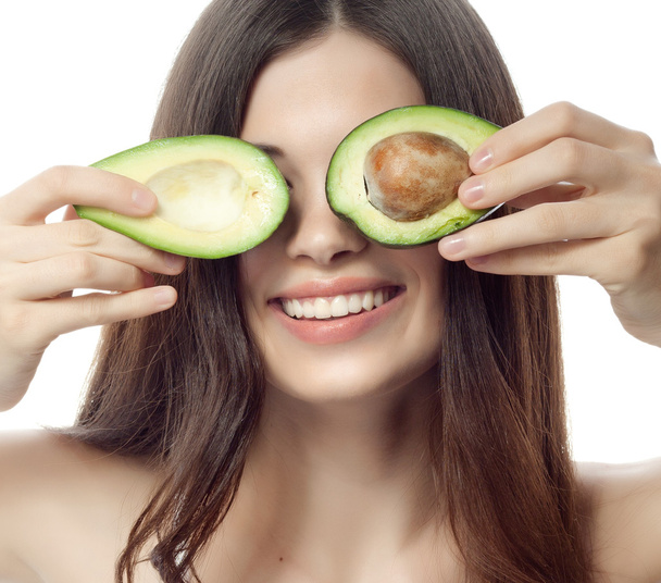 Smiling woman with with avocado - Foto, Imagem