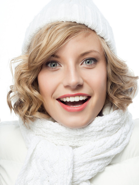 Smiling woman in warm clothing - Foto, afbeelding