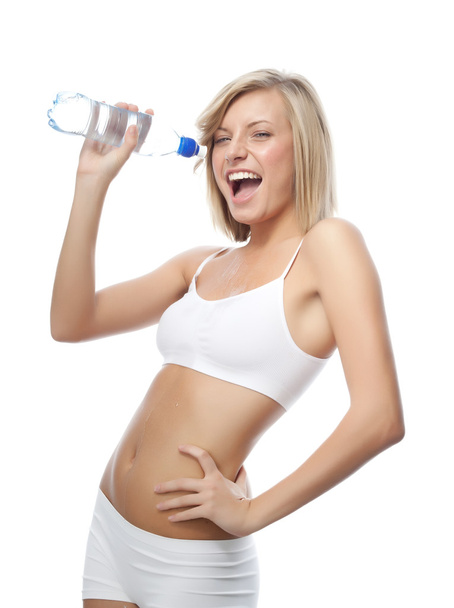 Woman with bottle of water - Foto, afbeelding