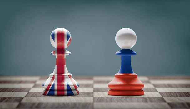 UK en Rusland conflict. Landvlaggen op schaakpionnen op een schaakbord. 3D illustratie. - Foto, afbeelding