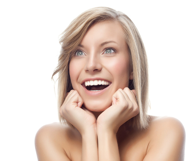 Surprised smiling blond woman - Foto, immagini
