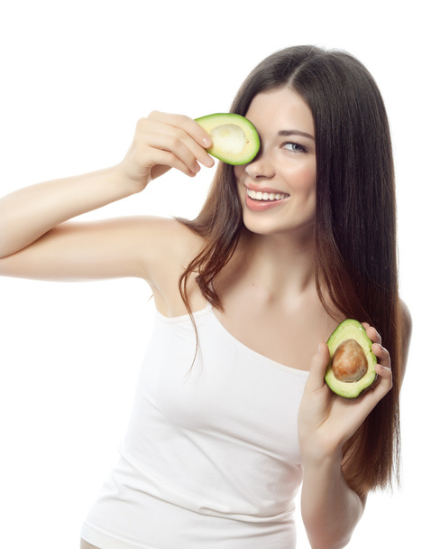 Smiling woman with with avocado - Foto, Imagem