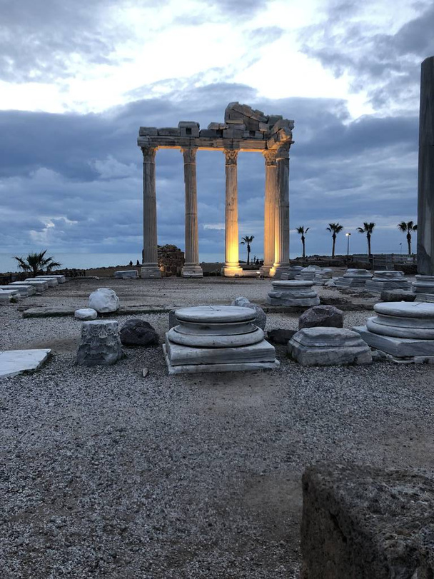 Night scene of Antalya ancient city. The Temple of Apollo in Side at sunset, Turkey - Photo, Image