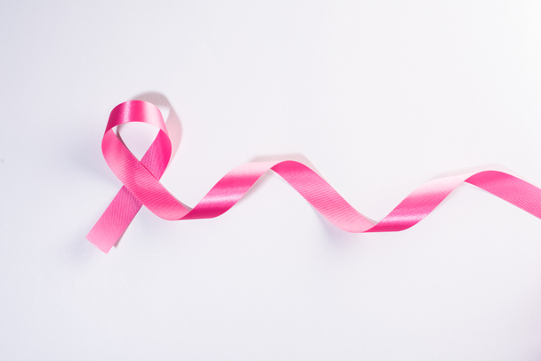 Pink ribbon cancer sign on white - Photo, Image