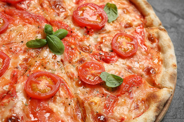 Delicious pizza Margherita on table, closeup view - Valokuva, kuva
